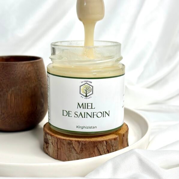 Pot de miel blanc du Kirghizistan artisanal, miel rare et crémeux aux fleurs sauvages, riche en bienfaits naturels et goût doux